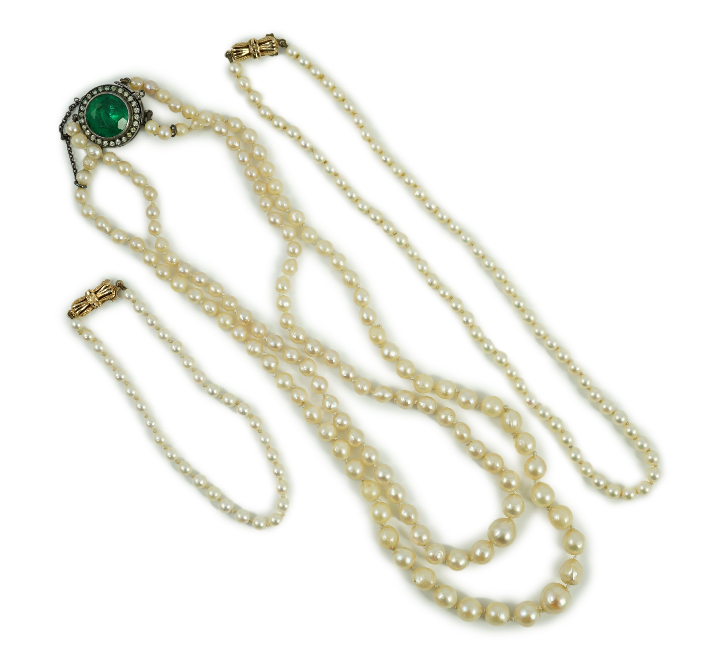 A twin strand graduated cultured pearl necklace, with white metal and two colour paste set clasp, 40cm, a single strand cultured pearl necklace, with 9ct gold clasp and a similar bracelet.